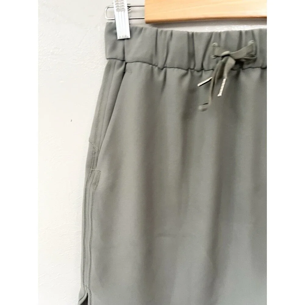 LULULEMON On The Fly Skirt Woven Size 6 Green Gray Sage GREEN Drawstring TRAVEL